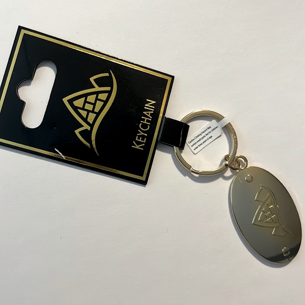 Disney Aulani Key Chain Gold medallion resort, and spa Hawaii